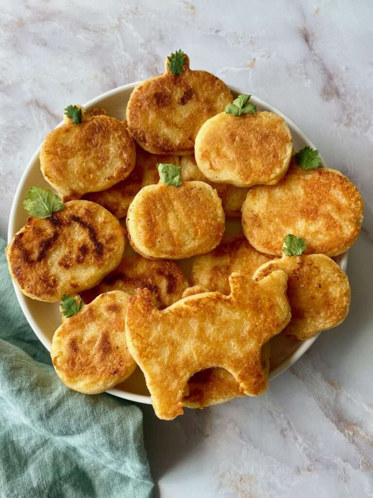 Pumpkin-Shaped Arepas for Halloween
